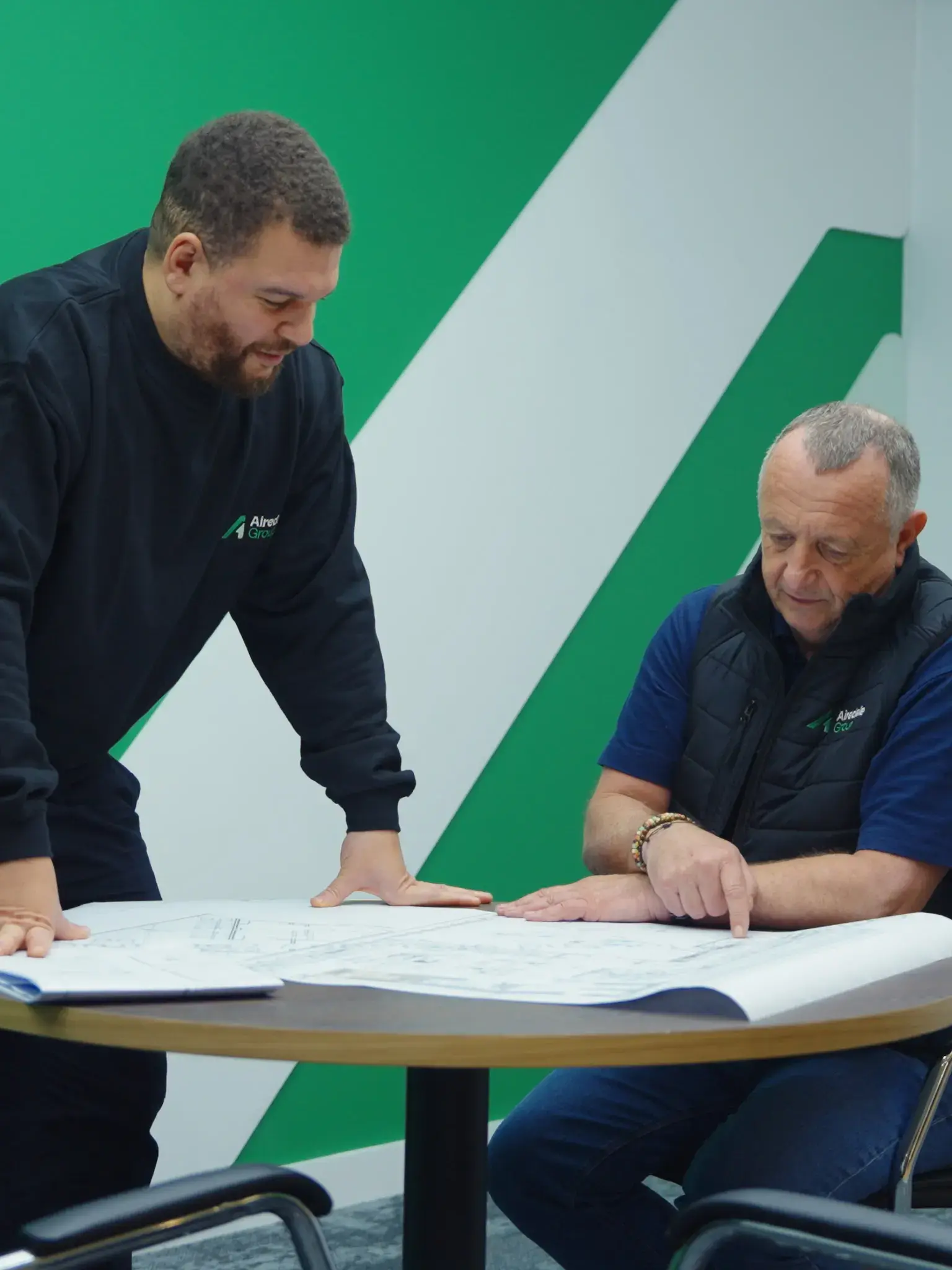 two airedale team collaborating