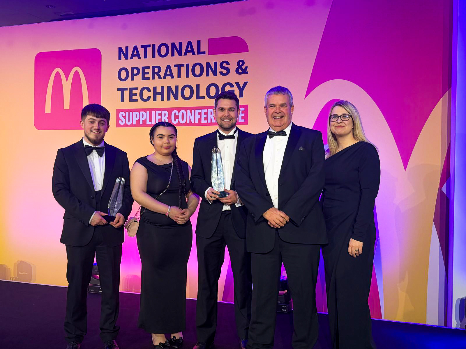 The Network Team celebrating at the